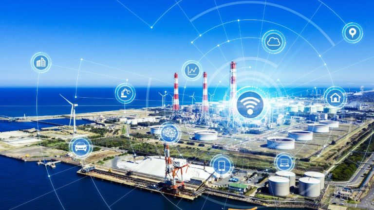 Industrial landscape featuring steel tanks and oilfield machinery, with digital connectivity icons symbolizing advanced manufacturing and efficiency in the oil and gas industry.